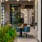Stylish lounge at Broadstone Saratoga featuring modern seating, greenery accents, and a sophisticated open design.