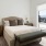 Bedroom with natural lighting and high ceilings