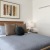 Bedroom with natural lighting and high ceilings